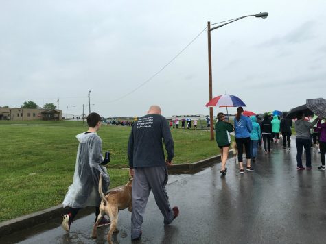 The line of walkers in the Humane Society 5K stretches on into the distance.