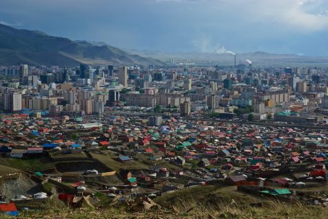 In Ulaanbaatar, tall office buildings sit within sight of historical sites and agricultural settlements.
