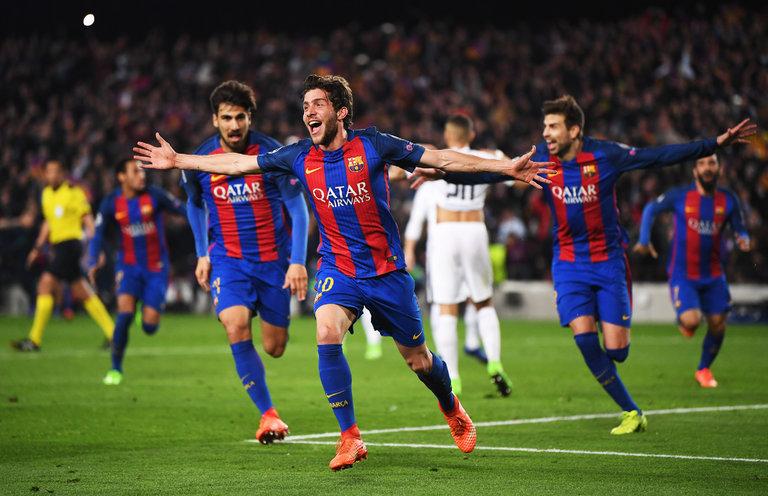 Sergi Roberto, center, celebrates after scoring the winning goal for Barcelona in stoppage time on Wednesday