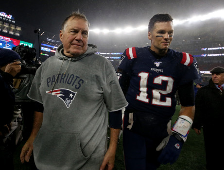 FOXBORO MA. - OCTOBER 27: New England Patriots head coach Bill Belichick smiles as he walks off the field with quarterback Tom Brady after beating the Cleveland Browns 27-13 for his 300th win at Gillette Stadium on October 27, 2019 in Foxboro, MA. (Staff Photo By Nancy Lane/MediaNews Group/Boston Herald)